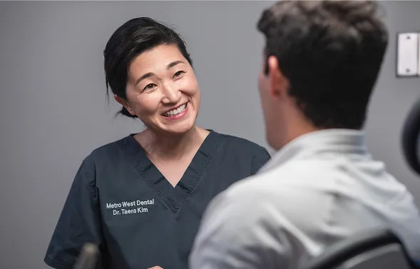 Dr Kim speaking with an orthodontic patient