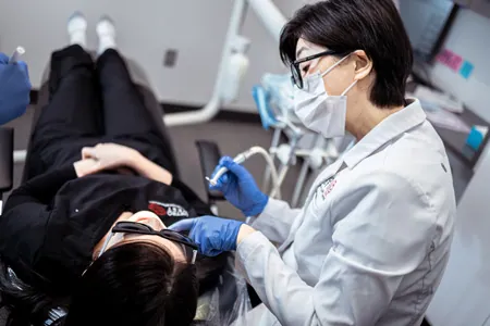 Doctor doing an orthodontic examination